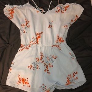 Floral romper. WORN ONCE